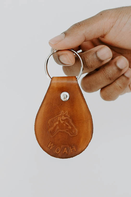 Close-up of handtooled western design on genuine leather keychain