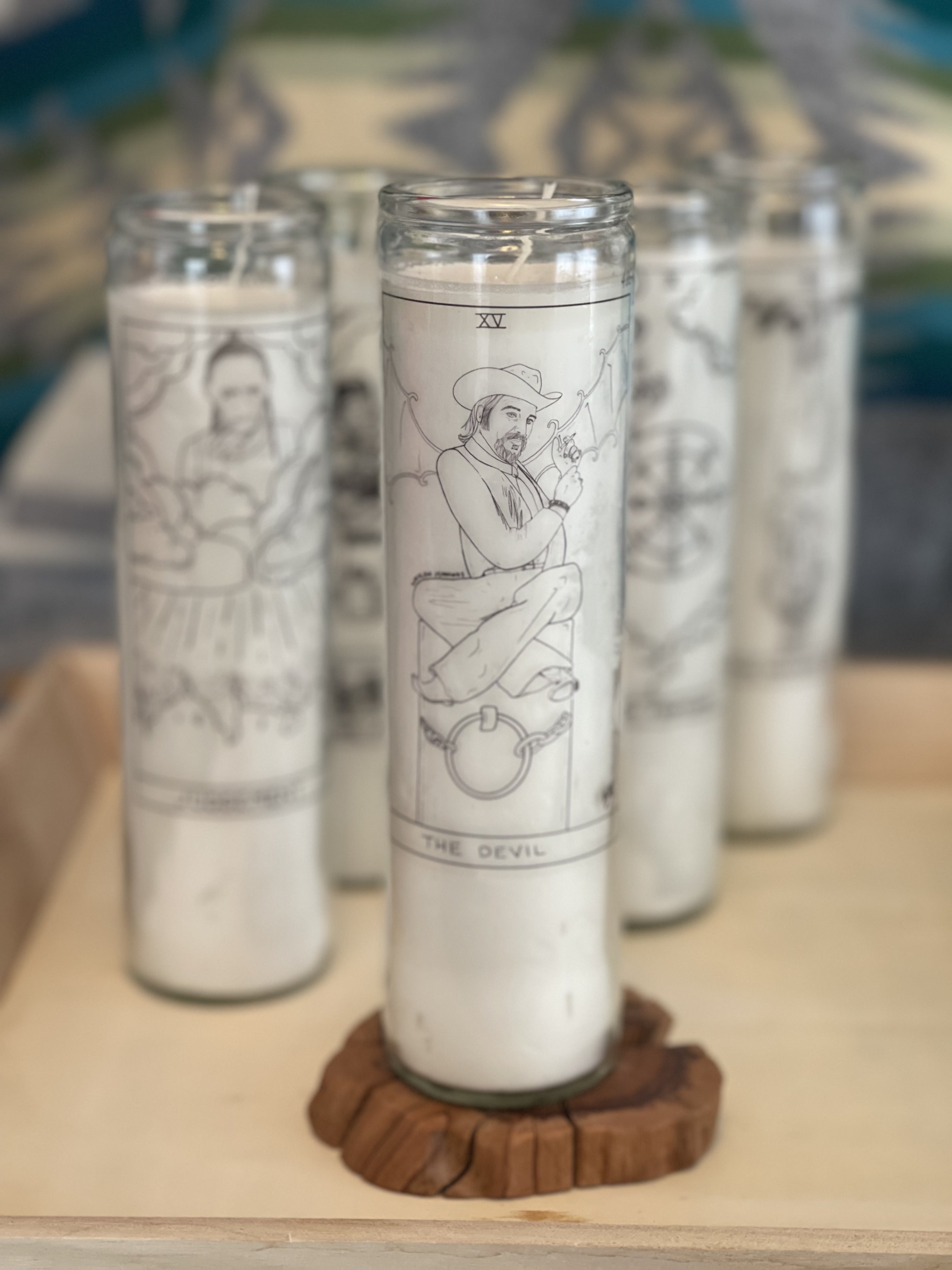 Waylon Jennings Devil prayer candle with black and white folk art illustration from The Outlaw Oracle's Honky Tonk Tarot Collection