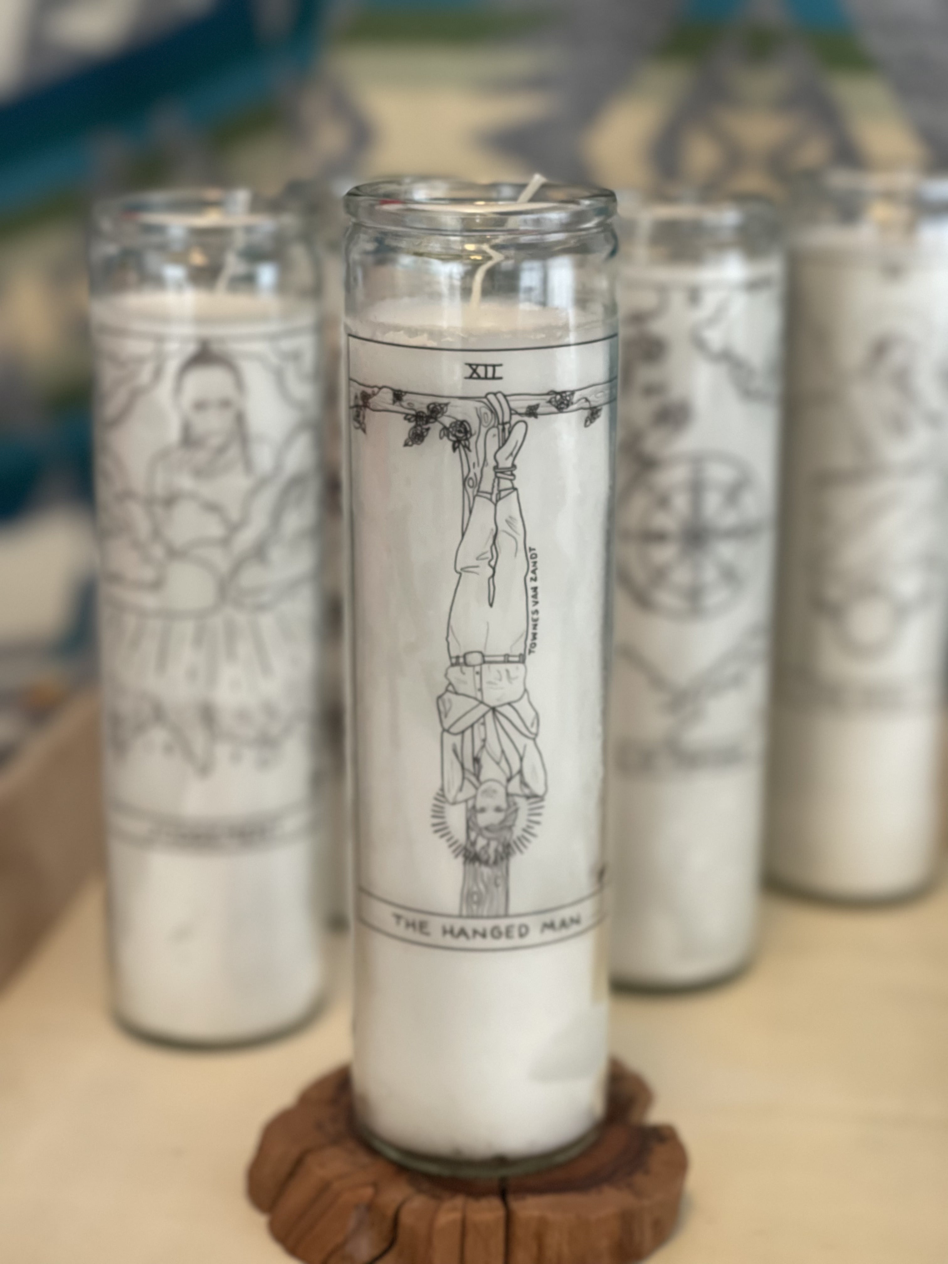 Townes Van Zandt Hanged Man Prayer Candle with black and white folk art illustration from The Outlaw Oracle's Honky Tonk Tarot Collection